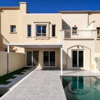 Villa pool construction Dubai with modern house design, pergola, and clear water pool